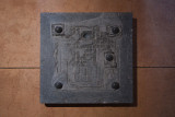 Felizitas Moroder, <em>5 Schwedenbomben, </em>2025, Belgian marble, canned goods, 60 × 60 × 6 cm – Thumbnail preview
