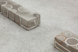 Javier Carro Temboury, <em>Café Transversal III</em>, 2024, Ceramic cups and dishes, coffee leftovers, cast in concrete then sliced; Wooden table, sliced – Thumbnail preview