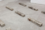 Javier Carro Temboury, <em>Café Transversal III</em>, 2024, Ceramic cups and dishes, coffee leftovers, cast in concrete then sliced; Wooden table, sliced – Thumbnail preview