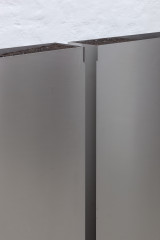 Rosario Aninat and Simon Shim-Sutcliffe, <em>Baby Teeth</em>, 2024, Stainless steel, dirt, typographic sorts (detail) – Thumbnail preview