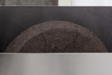 Rosario Aninat and Simon Shim-Sutcliffe, <em>Baby Teeth</em>, 2024, Stainless steel, dirt, typographic sorts (detail) – Thumbnail preview