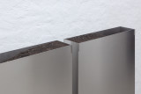 Rosario Aninat and Simon Shim-Sutcliffe, <em>Baby Teeth</em>, 2024, Stainless steel, dirt, typographic sorts (detail) – Thumbnail preview